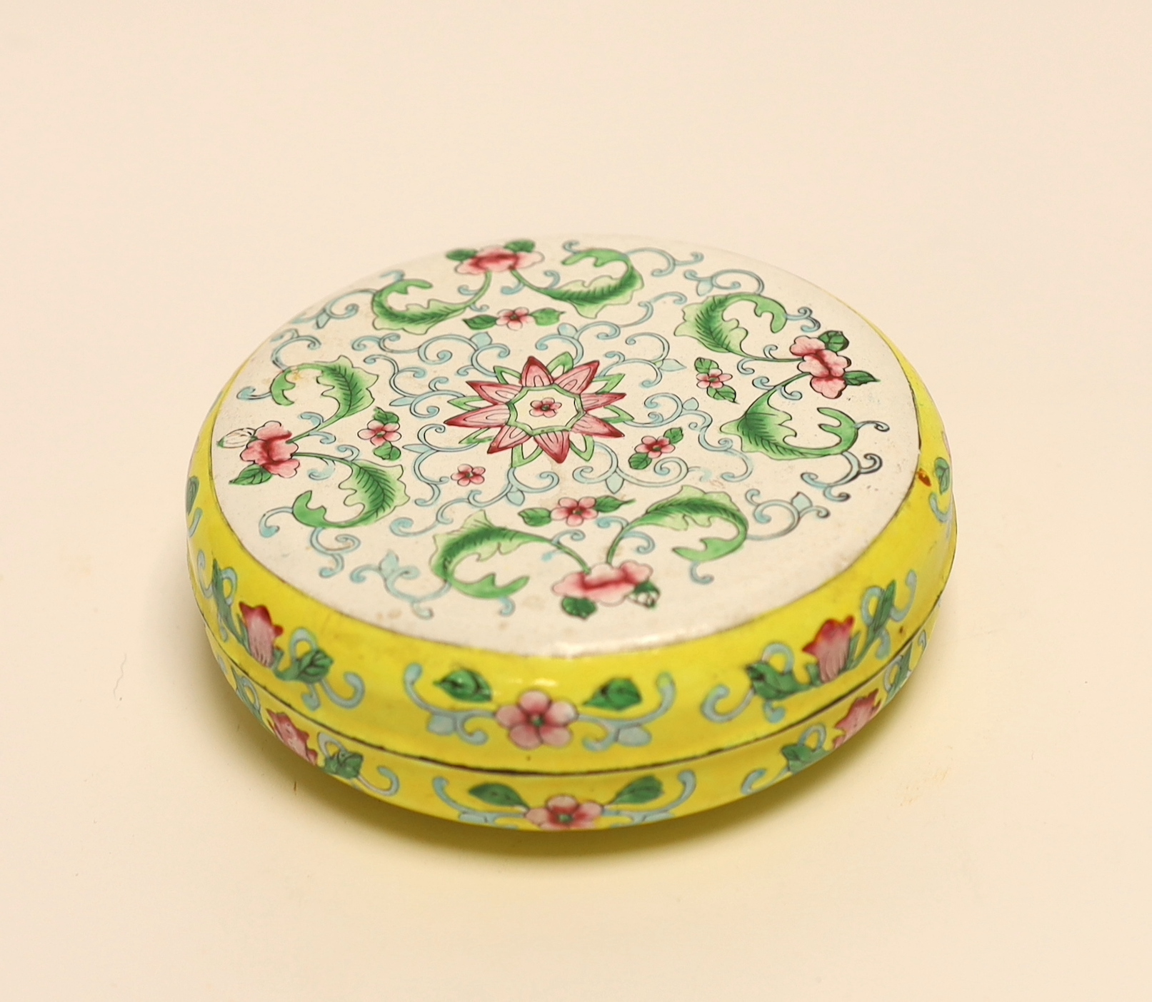 A Chinese Canton enamel circular box and cover, 13cm diameter